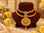Designer Copper based necklace set with red & green Stones looks gorgeous.